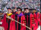 Board of Governors chair Sandy Stewart; honorary degree recipient Governor Phil Murphy; Secretary of the University Kimberlee Pastva, carrying the university mace; President Barchi; and honorary degree recipient Devin McCourty in procession